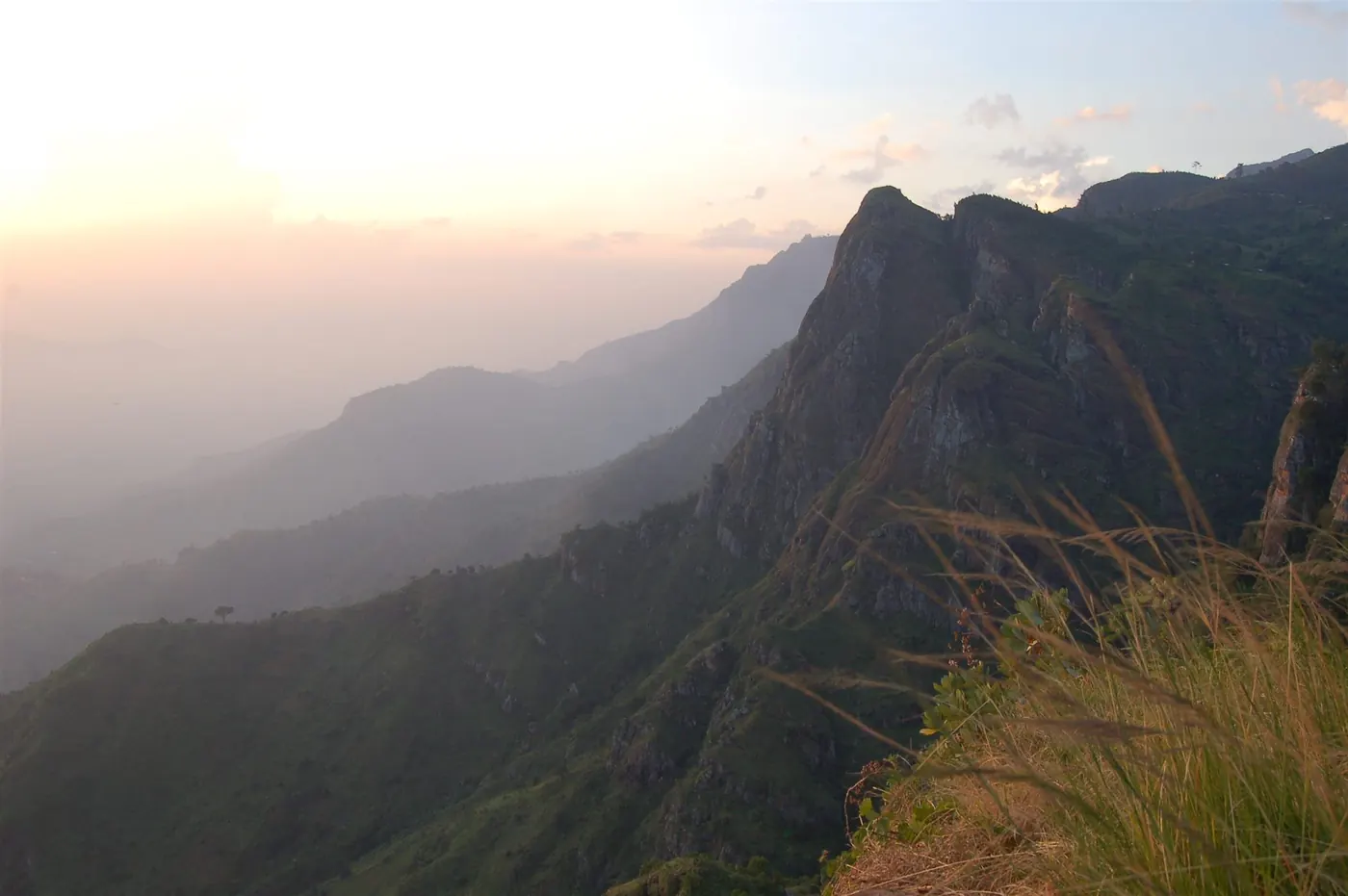 Steep green ridges of the Usambara Mountains at sunset